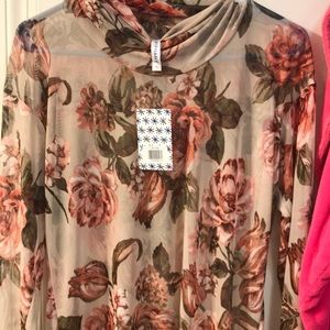 Beautiful floral sheer top.